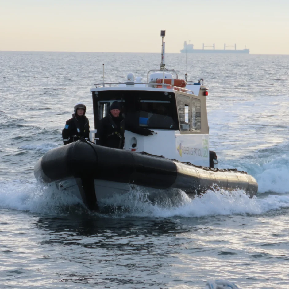Two IFCOs aboard NIFCA's patrol vessel.