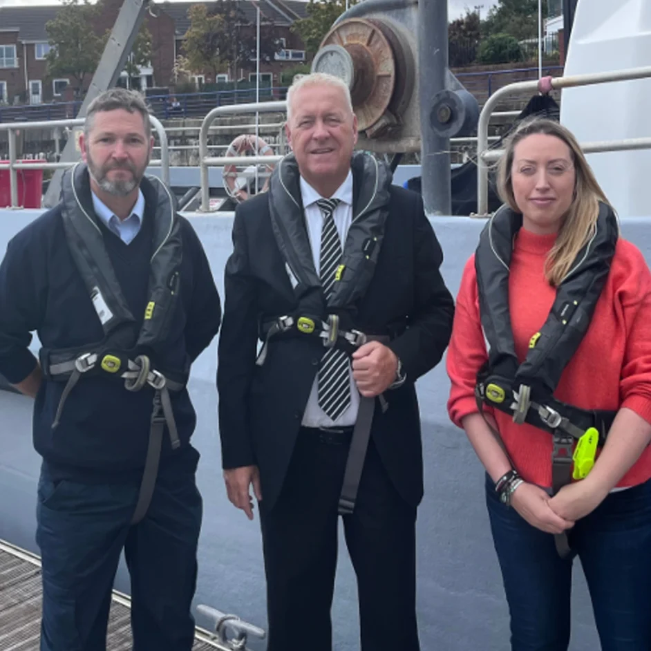 NIFCA team with Ian Lavery, MP for Blyth and Ashington, pictured in front of NIFCA's patrol vessel.